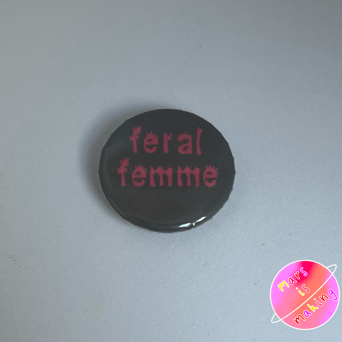 Biting Butch/Feral Femme Badge