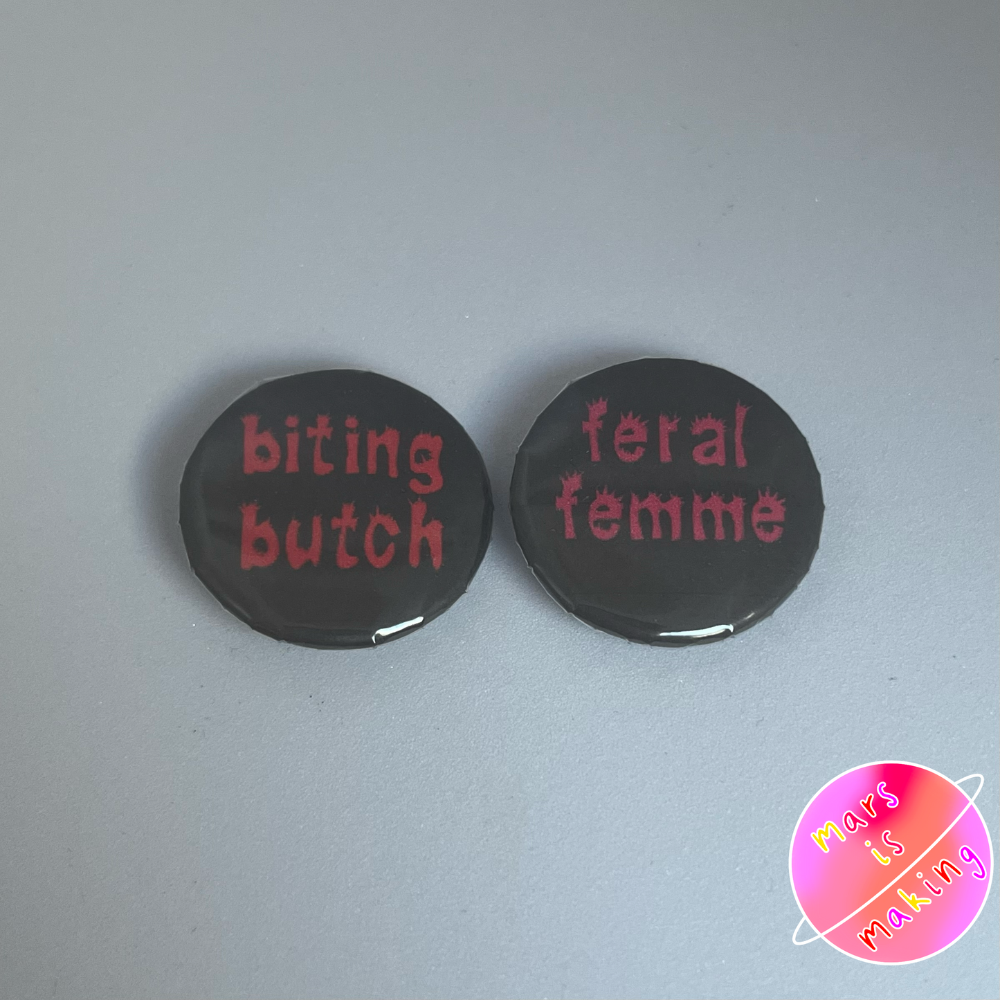 Biting Butch/Feral Femme Badge